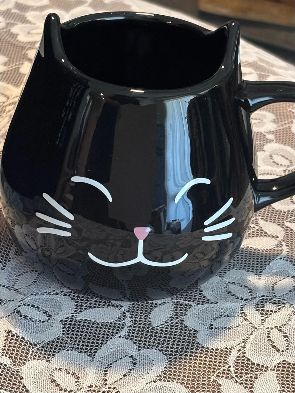 Very cute Ceramic Mug, Smiling Black Cat w Ears on Rim, Paw Print Inside.